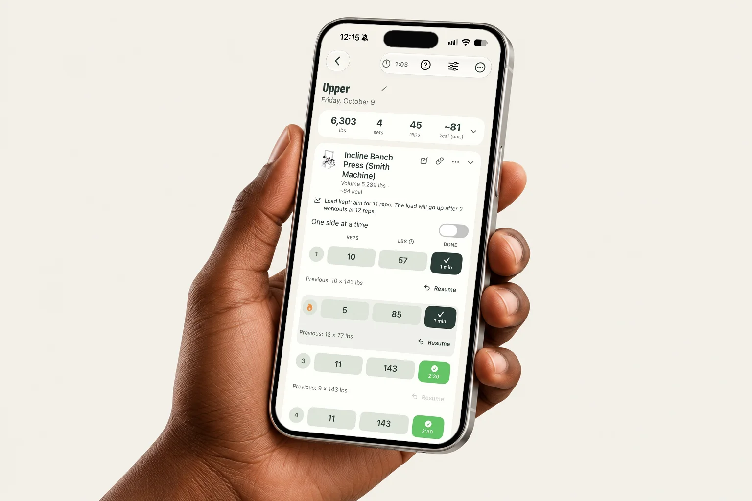 STARK workout app shown on a phone held in a hand
