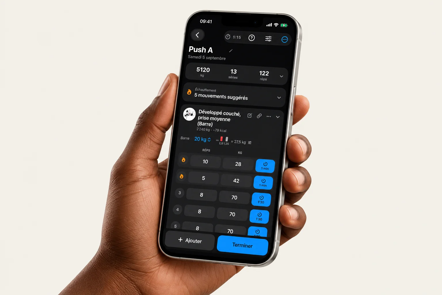 STARK workout app shown on a phone held in a hand